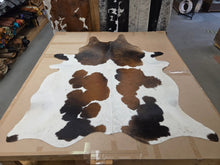 TC042616 Load image into Gallery viewer, Natural Hair On Cowhide Rugs - Buckskin Leather Co.